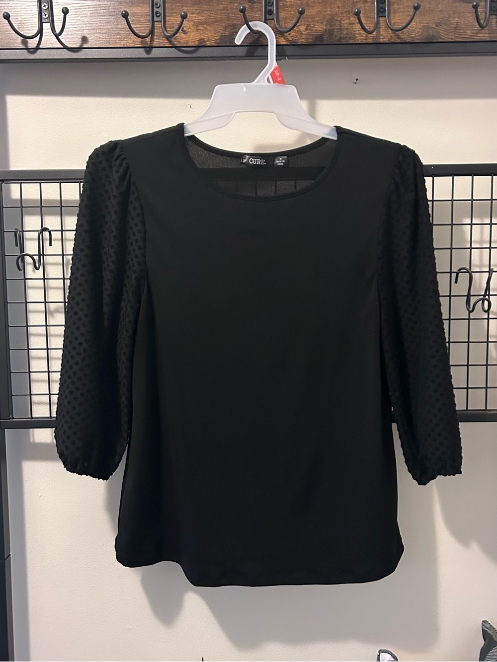 Cure. Black Textured Puff-Sleeve Blouse